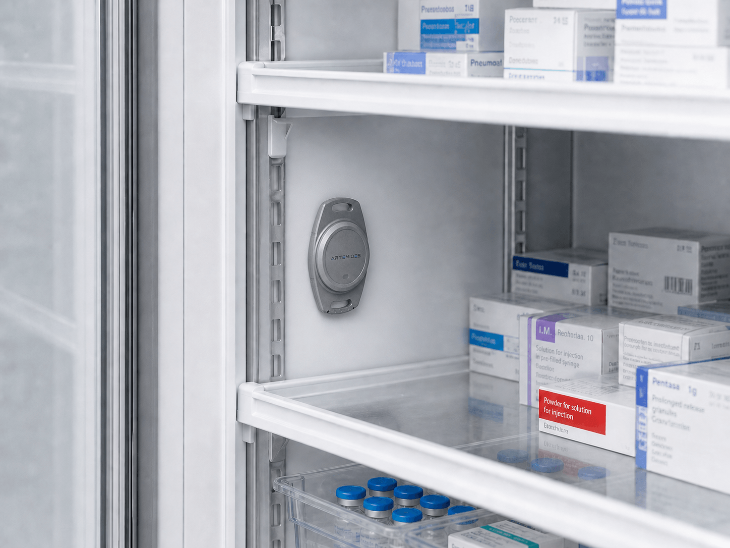 Eight-centimetre ARTEMIDES sensor installed inside a hospital refrigerator